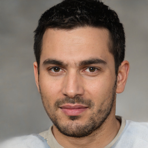 Neutral white young-adult male with short  black hair and brown eyes