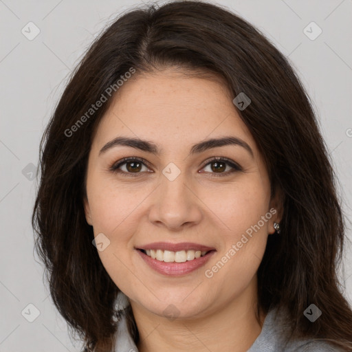 Joyful white young-adult female with long  brown hair and brown eyes