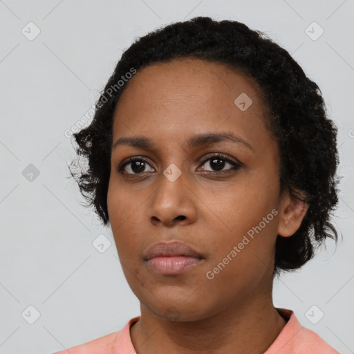 Neutral black young-adult female with short  black hair and brown eyes