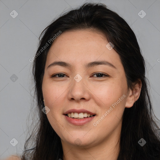 Joyful white young-adult female with long  brown hair and brown eyes