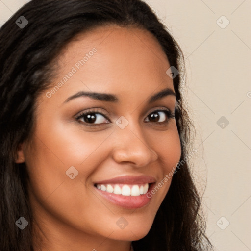 Joyful latino young-adult female with long  brown hair and brown eyes