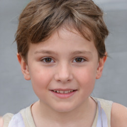 Joyful white child female with short  brown hair and brown eyes