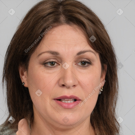 Joyful white adult female with medium  brown hair and brown eyes