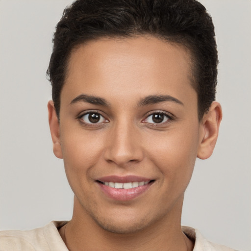 Joyful white young-adult female with short  brown hair and brown eyes