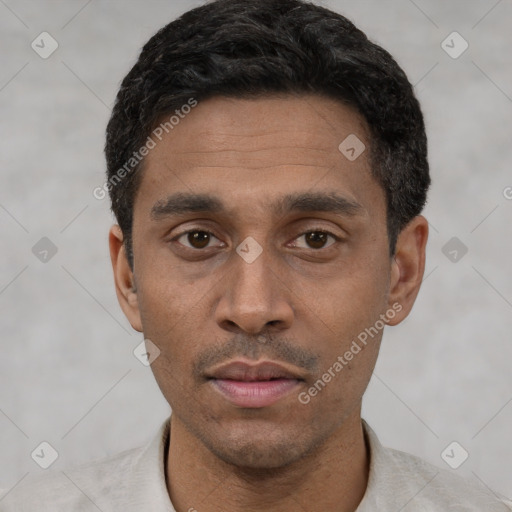 Neutral latino young-adult male with short  black hair and brown eyes