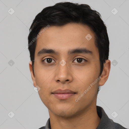 Neutral latino young-adult male with short  black hair and brown eyes