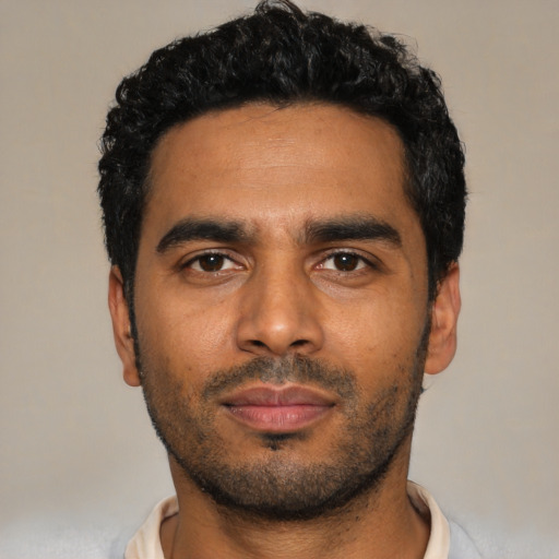 Neutral black young-adult male with short  black hair and brown eyes