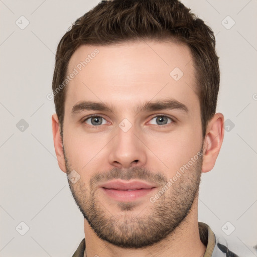 Neutral white young-adult male with short  brown hair and grey eyes