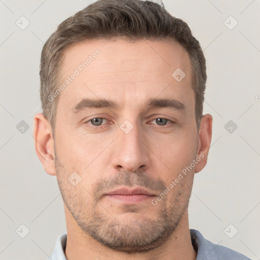 Neutral white adult male with short  brown hair and brown eyes