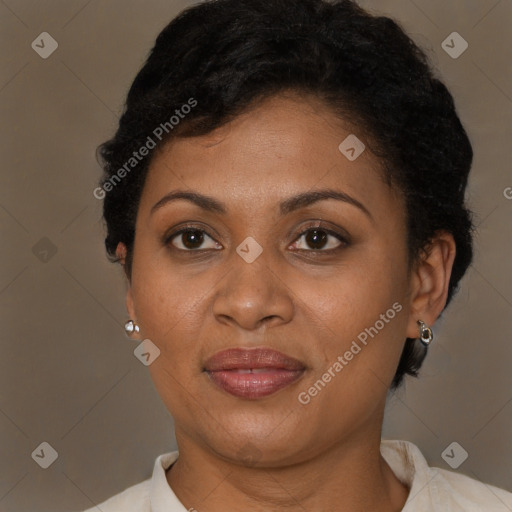 Joyful latino adult female with short  brown hair and brown eyes