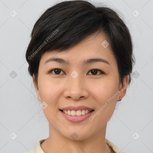 Joyful asian young-adult female with medium  brown hair and brown eyes