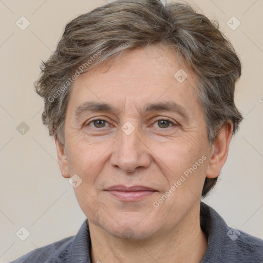 Joyful white middle-aged male with short  brown hair and brown eyes