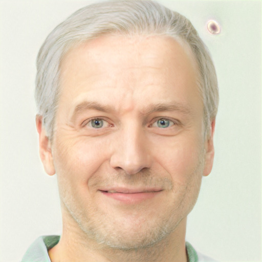 Joyful white adult male with short  brown hair and grey eyes