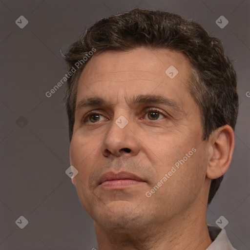Neutral white adult male with short  brown hair and brown eyes