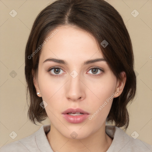 Neutral white young-adult female with medium  brown hair and brown eyes