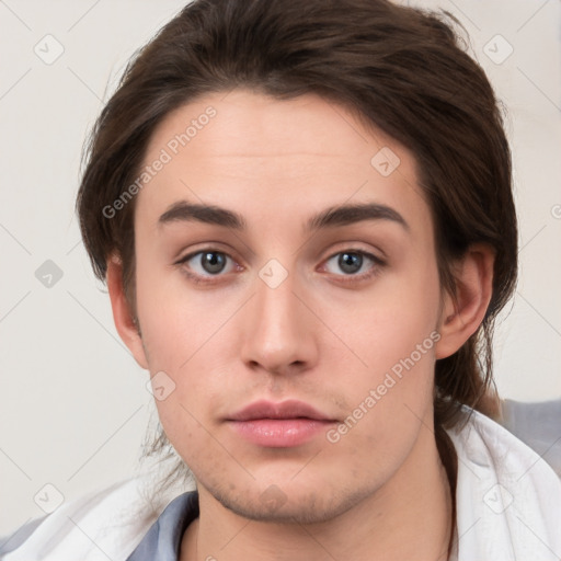 Neutral white young-adult female with short  brown hair and brown eyes