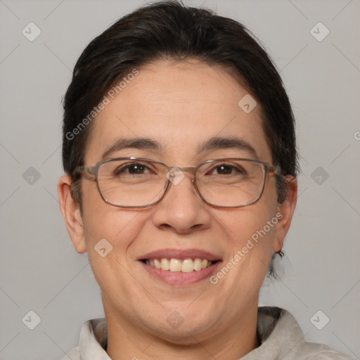 Joyful white adult female with short  brown hair and brown eyes