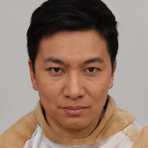 Neutral asian young-adult male with short  brown hair and brown eyes