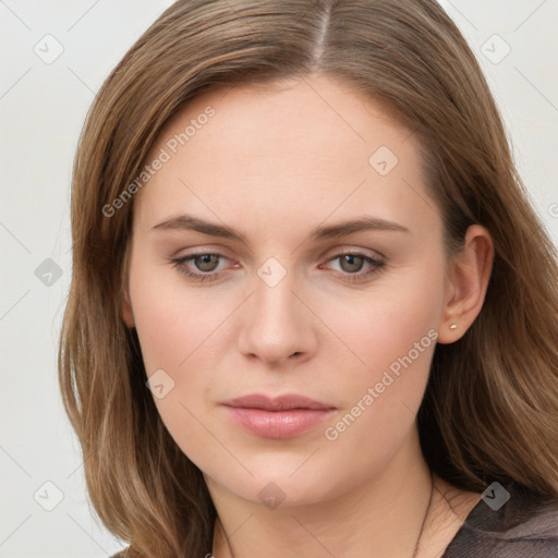 Neutral white young-adult female with long  brown hair and brown eyes