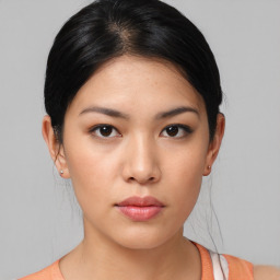 Neutral asian young-adult female with medium  black hair and brown eyes