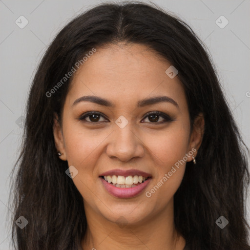 Joyful latino young-adult female with long  brown hair and brown eyes