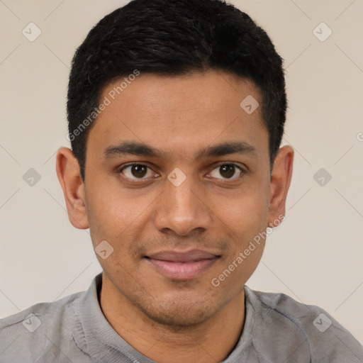 Joyful latino young-adult male with short  black hair and brown eyes