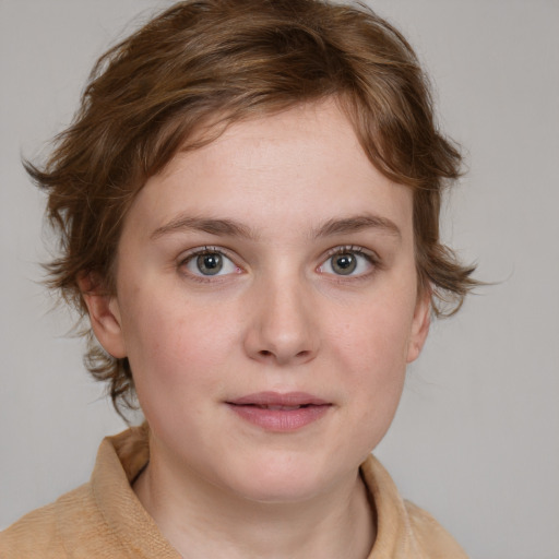 Joyful white young-adult female with medium  brown hair and blue eyes