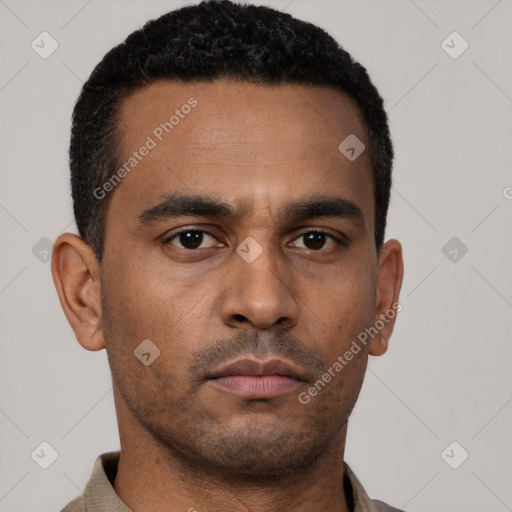 Neutral latino young-adult male with short  black hair and brown eyes