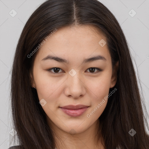 Joyful asian young-adult female with long  brown hair and brown eyes