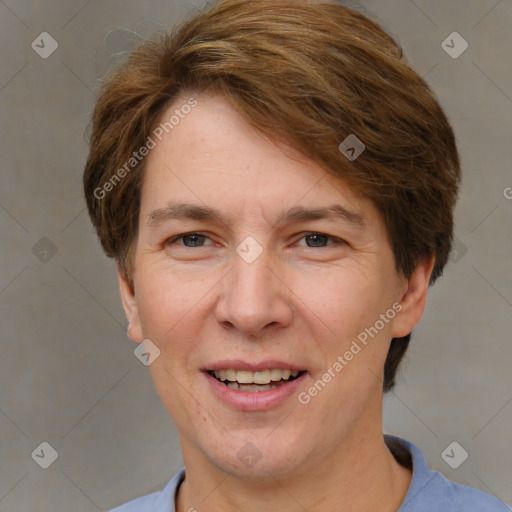 Joyful white adult female with short  brown hair and grey eyes