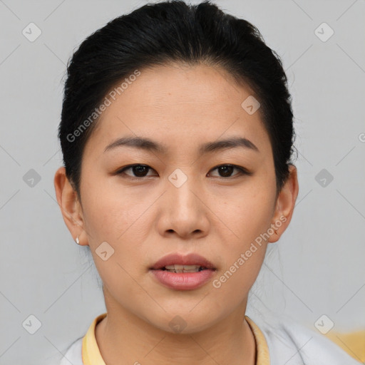 Joyful asian young-adult female with short  brown hair and brown eyes