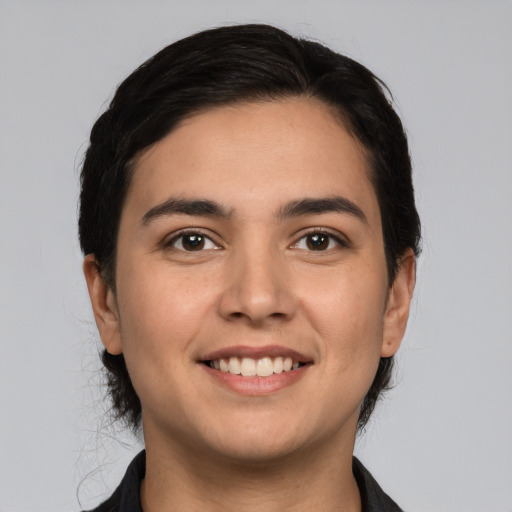 Joyful white young-adult male with medium  brown hair and brown eyes