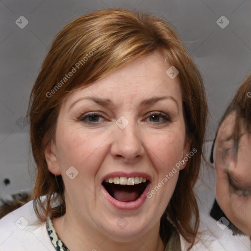 Joyful white adult female with medium  brown hair and blue eyes