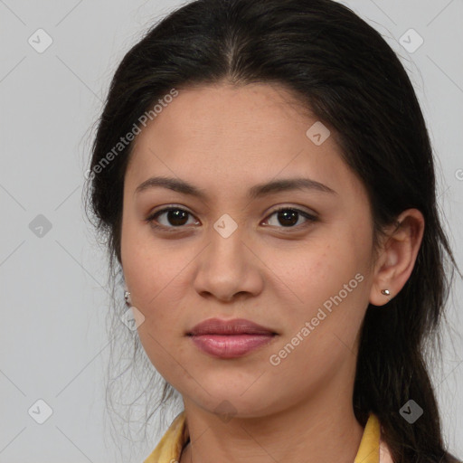 Joyful latino young-adult female with medium  brown hair and brown eyes