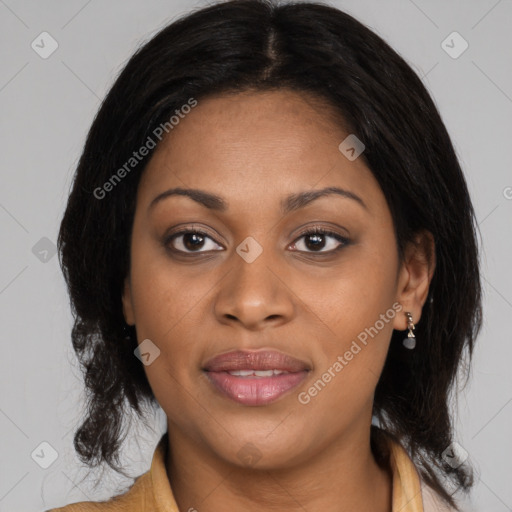 Joyful black young-adult female with medium  brown hair and brown eyes