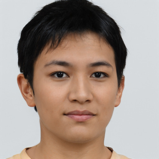 Joyful asian young-adult female with short  brown hair and brown eyes