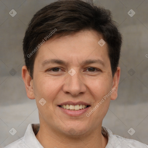 Joyful white adult male with short  brown hair and brown eyes