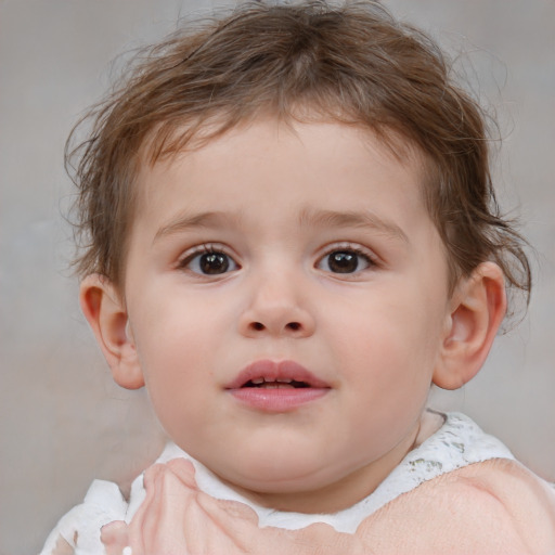 Joyful white child male with medium  brown hair and blue eyes