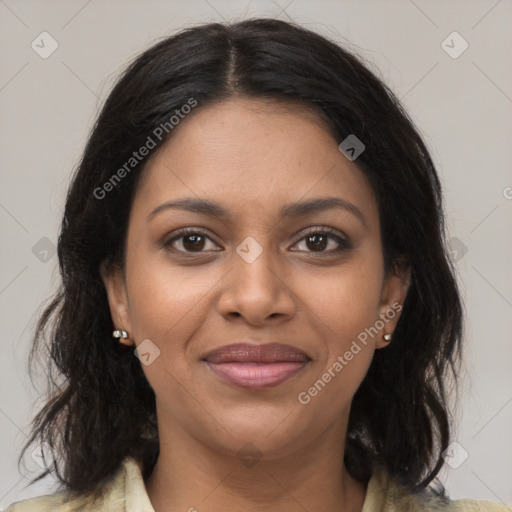 Joyful black young-adult female with medium  brown hair and brown eyes