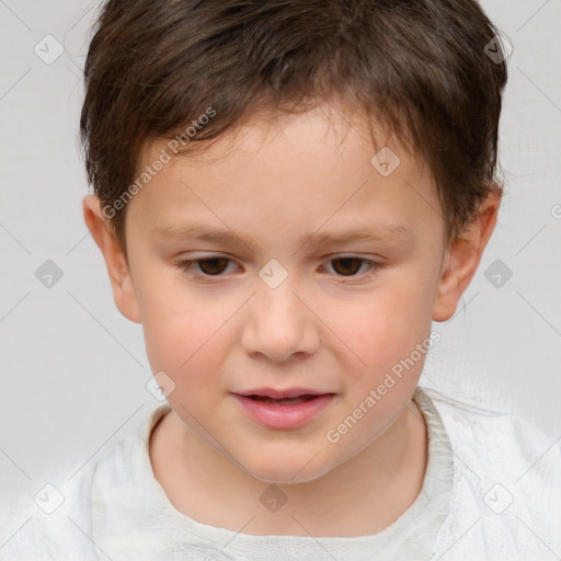 Joyful white child male with short  brown hair and brown eyes