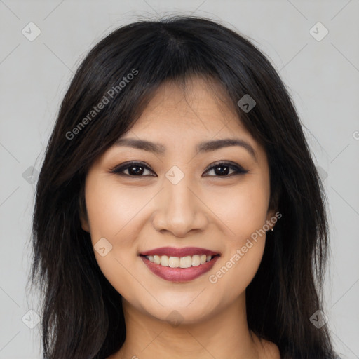 Joyful asian young-adult female with long  brown hair and brown eyes