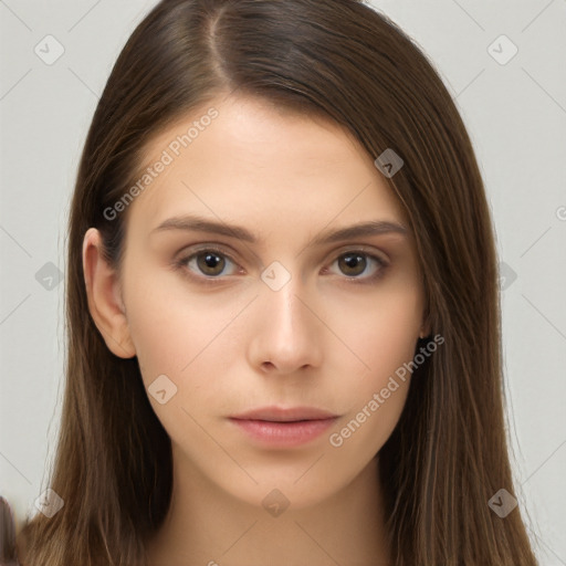 Neutral white young-adult female with long  brown hair and brown eyes