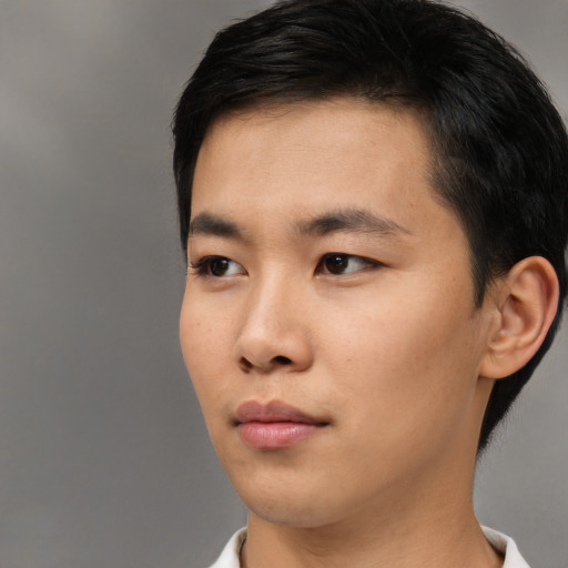 Neutral asian young-adult male with short  black hair and brown eyes