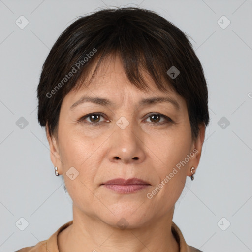 Joyful white adult female with short  brown hair and brown eyes