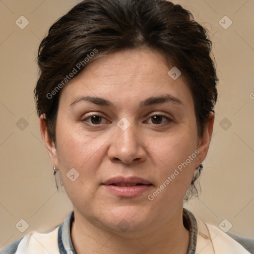 Joyful white adult female with short  brown hair and brown eyes