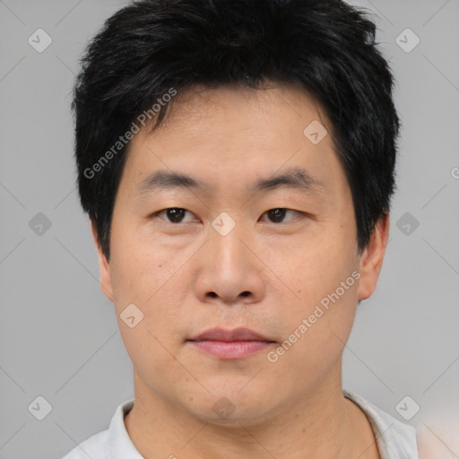 Neutral asian young-adult male with short  black hair and brown eyes