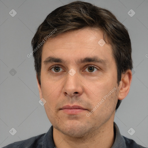 Neutral white adult male with short  brown hair and brown eyes