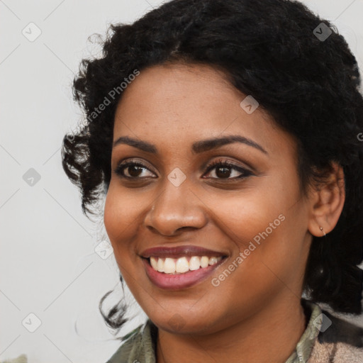 Joyful latino young-adult female with medium  black hair and brown eyes