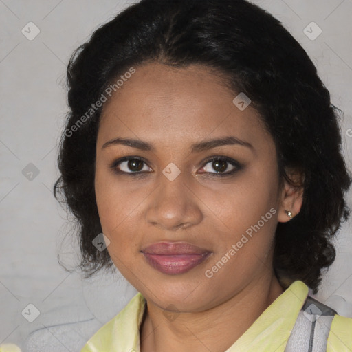 Joyful black adult female with medium  brown hair and brown eyes