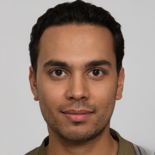 Neutral white young-adult male with short  black hair and brown eyes